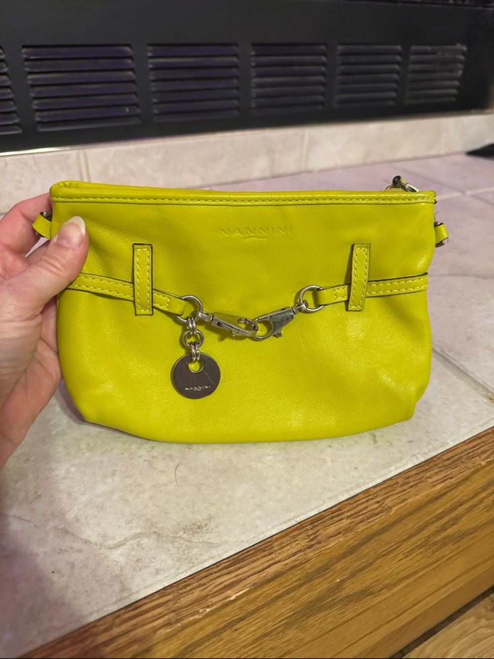 Nannini bright mustard yellow Leather Wristlet with Silver Charm